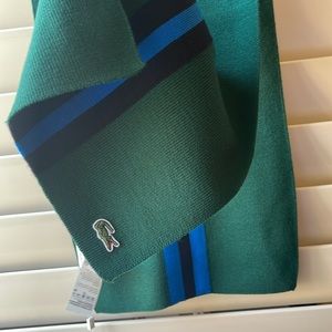 Lacoste Scarf 100% wool, Measures 13” W, 70” long. Environment friendly